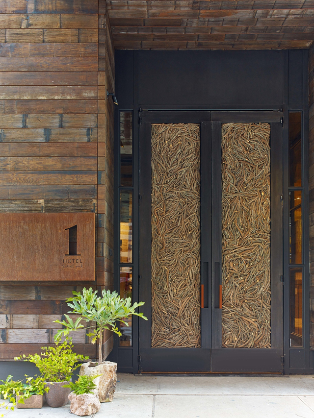 Doors made of 16,000 fallen twigs welcome guests to 1 Hotel Central Park. Photo Credit Eric Laignel